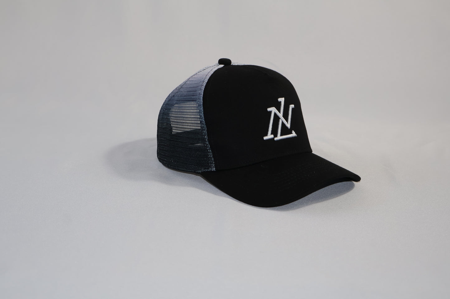 Unisex Trucker Cap- Black & Pink | Adjustable Mesh Hat With Embroidered Logo